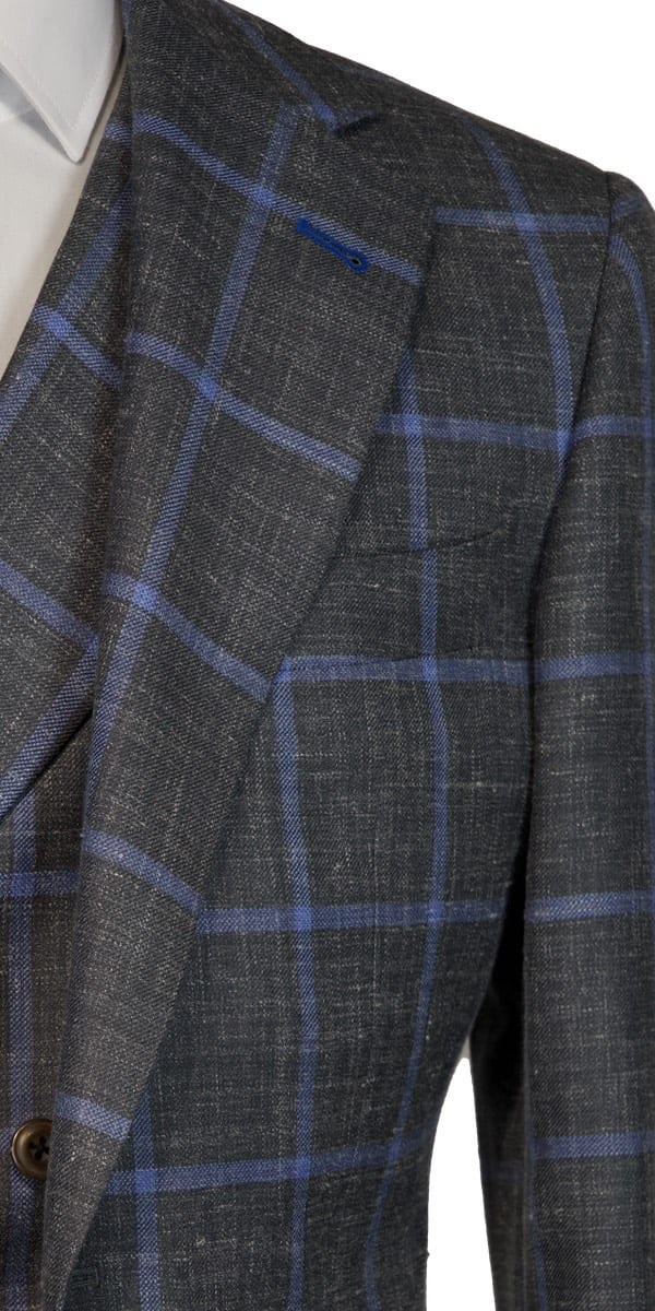Complet gris avec carreaux bleu ciel